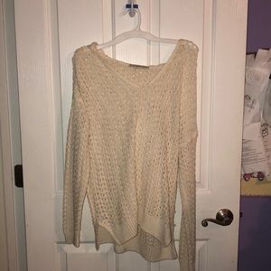 Long sleeve hooded sweater.